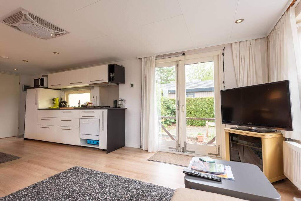 Knus Huisje Op Kindvriendelijk Park Met Zwembad Otterlo Exterior photo